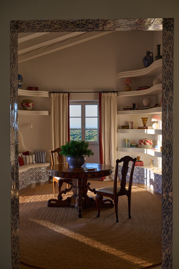 The library seen through its tiled doorway, with the view beyond