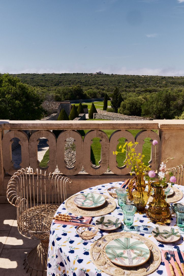 A table laid for lunch above the gardens